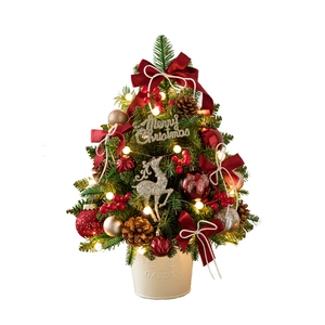 Mini pre-lit desktop Christmas tree with red bows, ornaments and warm LED lights