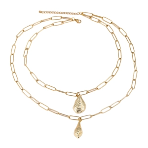 Double layer gold paperclip chain necklace with shell and conch pendants on white background