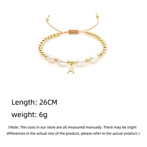 Baroque natural pearl bracelet with 18K gold beads and letter A charm for women
