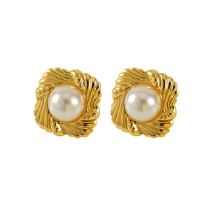 Elegant gold titanium steel stud earrings featuring large pearls with spiral texture details