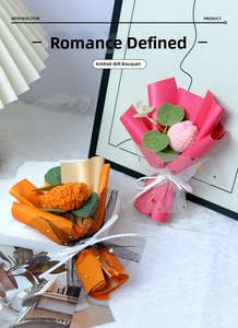 Detail of handmade knitted flowers with gold star mesh wrap and elegant silk ribbon