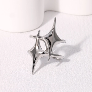 Minimalist stainless steel star ring with overlapping four-point stars in silver finish