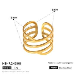 Detailed macro view of 18K gold-plated stainless steel layered star and leaf ring