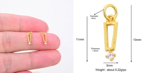 Detailed view of gold geometric trapezoid stud earrings with dimensions and weight info