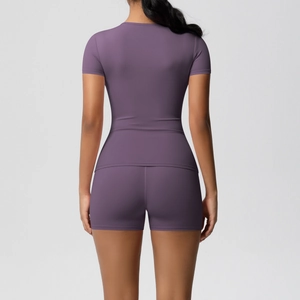 Rear view of purple seamless yoga set with high-stretch top and cycling shorts