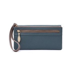Detail of green litchi grain leather long wallet with golden leaf zipper pulls