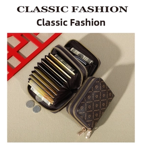 Internal detail of accordion card slots and dual zipper compartments in leather wallet