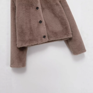 Faux fur short jacket in coffee brown with three large black buttons and soft texture