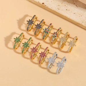 Elegant gold and silver star earrings set with colorful cubic zirconia stones