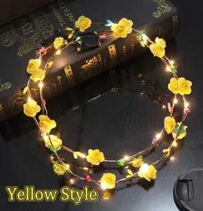 Close-up of yellow foam rose LED wreath with micro switch on reflective surface