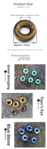 Macro detail of 15mm natural aventurine and tiger eye stone beads with 5mm large holes
