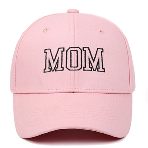 Detail of pink cotton baseball cap with black MOM embroidery and premium stitching