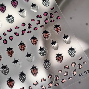 Pink strawberry nail stickers with leopard print accents and glitter texture for nail art