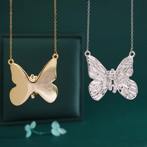 Elegant gold and silver butterfly pendant necklaces on titanium steel chain set