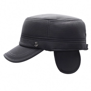Winter flat top cadet hat for men featuring ear protection flaps and a metal shield emblem