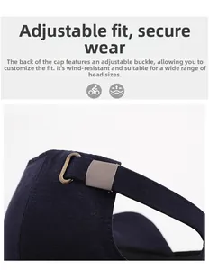 Detail of adjustable metal buckle and navy twill fabric on the back of baseball cap