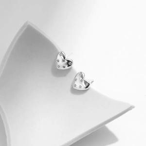 Sparkling 925 sterling silver heart stud earrings with cubic zirconia stones