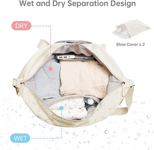 Detail view of the wet and dry separation compartment in a beige travel fitness bag