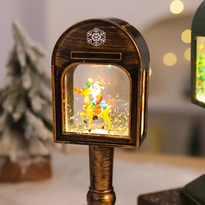 Detail of Christmas mailbox water globe lamp with Santa on reindeer and warm bokeh lights