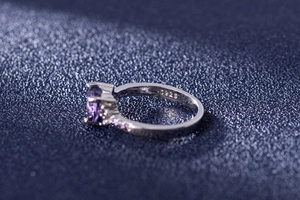 Macro shot of S925 sterling silver hallmark inside amethyst heart ring band