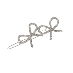 Sparkling silver metal hair clip with three rhinestone encrusted bows for women