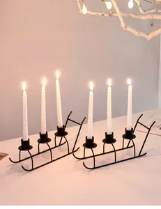Nordic sleigh metal candle holder set with six white spiral candles for festive table decor