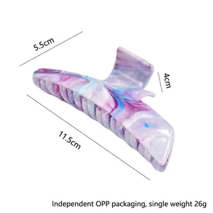 Large marble pattern hair claw clip in purple and blue, measuring 11.5cm for women's styling