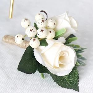 Wedding boutonniere with white silk roses, faux berries and jute rope wrapped handle