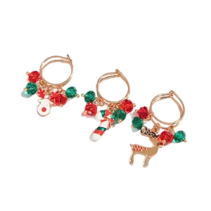 Christmas jewelry set featuring reindeer and candy cane pendants with festive red green beads