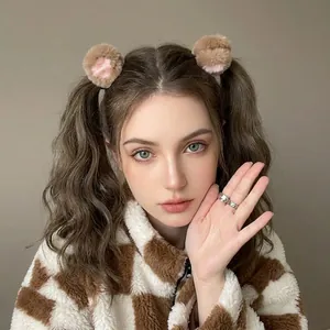 Cute plush ear hair clips for girls in Japanese style worn by a model in casual setting