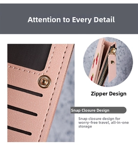 Detail of pink lychee leather wallet with cherry embroidery, card slots and zip pocket