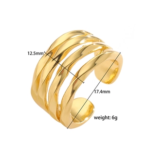 Detail view of gold layered wavy ring showing 12.5mm width and 17.4mm inner diameter