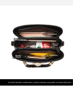 Internal view of spacious handbag showing compartments for iPad, umbrella and wallet