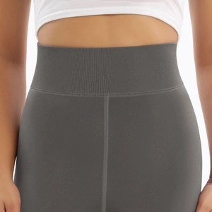 Detail of the wide ribbed high waistband on these dark grey thermal yoga leggings
