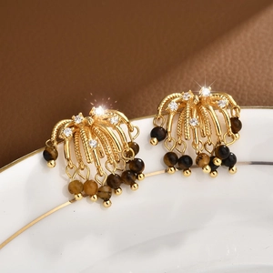 Elegant gold tiger eye tassel earrings with fireworks shape and sparkling zircons