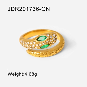 Vintage gold snake ring in titanium steel with green stone eyes and clear diamonds