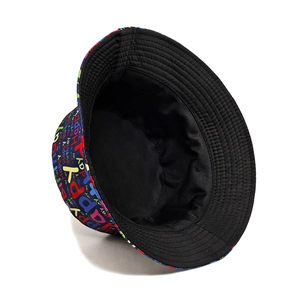 Reversible bucket hat with Happy Birthday print and solid black lining for sun protection
