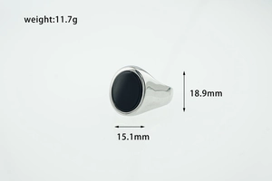 Detailed view of an oval black onyx ring in vintage silver finish with measurements