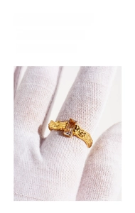 Macro view of irregular lava texture ring with a rectangular cubic zirconia stone