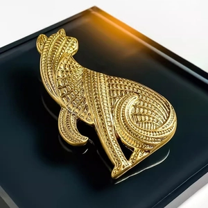 Vintage golden leopard brooch in sitting pose with intricate metal mesh texture for suits