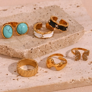 Variety of 18K gold-plated stainless steel open rings with turquoise and enamel details
