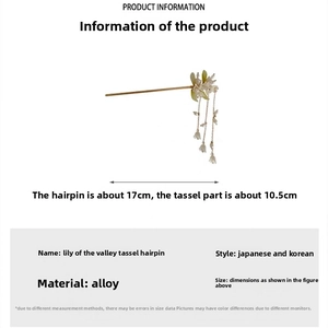 Detail of lily of the valley hair stick with tassels and white floral beads in 17cm length