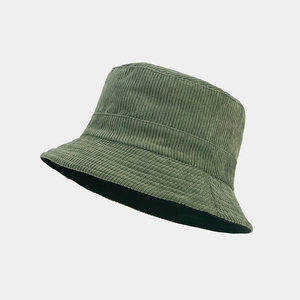 Detailed close-up of corduroy texture and stitching on an olive green bucket hat