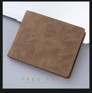Close-up of brown matte litchi grain leather wallet with fine stitching details