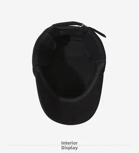 Interior view of men's winter cap showing breathable lining and ear flap details