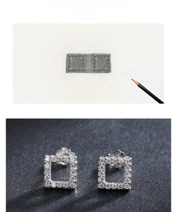 Macro shot of S925 sterling silver square stud earrings with pave-set cubic zirconia