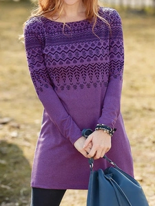 Close-up of ethnic floral print and soft brushed knit texture on purple long sleeve dress