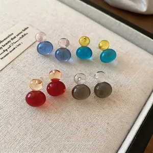 Translucent gourd-shaped stud earrings in four colorful dopamine-style acrylic shades