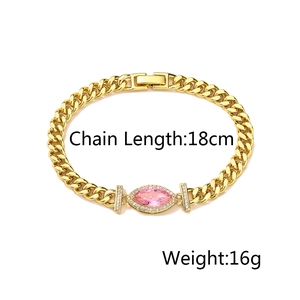 Detail of 18cm gold Cuban chain bracelet featuring a pink marquise zircon stone