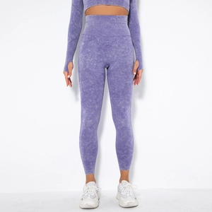 Detailed texture of purple acid wash seamless knit high waist leggings and thumb hole top